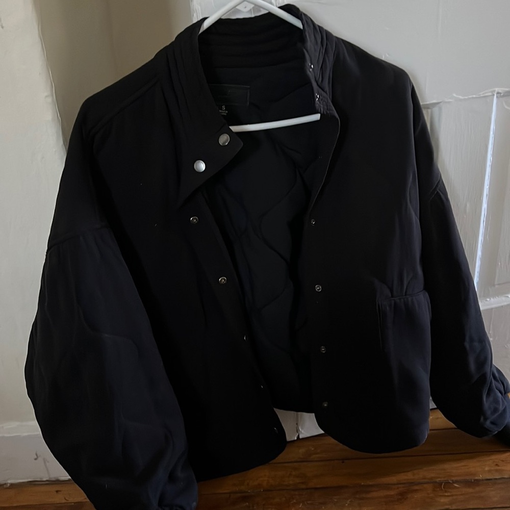 Oversized button up jacket. Stitching detail.